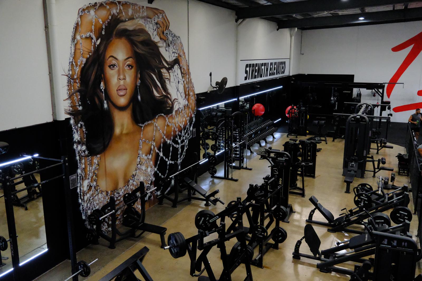 LIFT'D gym floor with mural